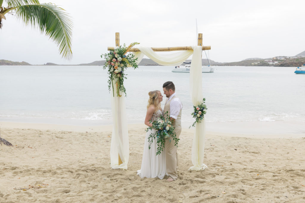 Secret Harbour Beach Wedding under the arch couple